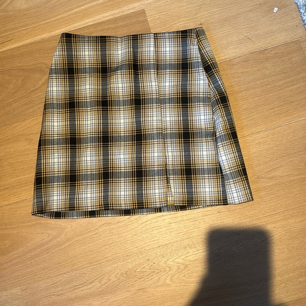 Urban Outfitters yellow plaid skirt  Yellow, 
black plaid skirt two pockets